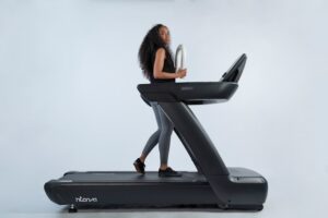 a-woman-is-walking-on-a-treadmill